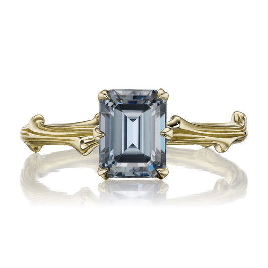 ::color_yellow ::| 1.75ct emerald cut Iconic grey moissanite solitaire engagement ring with a twig band yellow gold front view