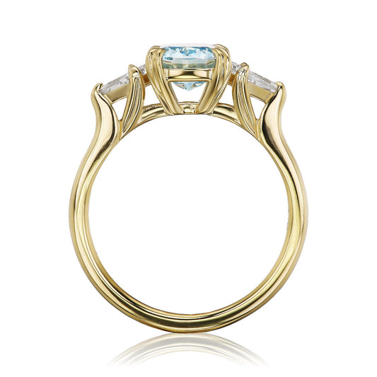 ::color_yellow ::| Raven 2ct scissor cut elongated cushion lab-grown blue diamond solitaire engagement ring with kite accent diamonds in yellow gold standing side view