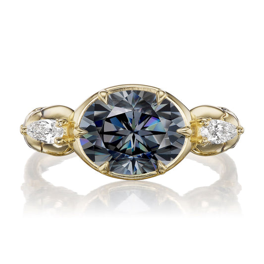 ::color_yellow ::| 2.65ctw oval grey moissanite engagement ring Juliet Skull memento mori yellow gold diamond accents laying flat top view