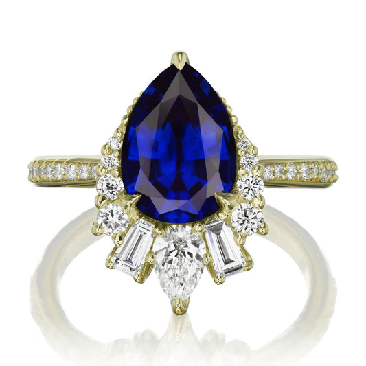 ::color_yellow ::shank_halfway_three-quarters ::shank_three-quarters_halfway_no ::| 3.28ctw+ pear blue sapphire engagement ring with diamond accents Artemis yellow gold diamond shank front view