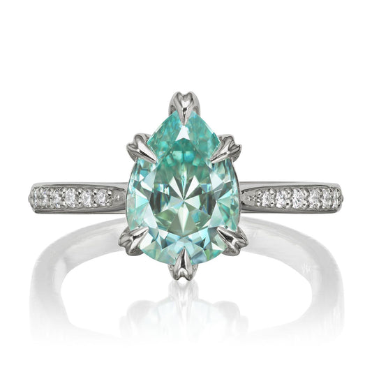::color_white ::| 2.1ctw pear aqua-teal moissanite engagement ring Petra white gold diamond shank front view