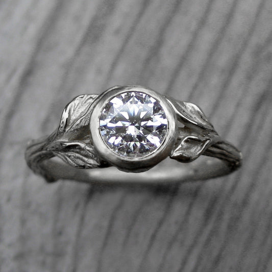 1ct white gold twig and leaf bezel engagement ring with a Forever One moissanite