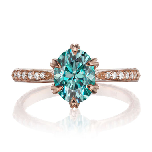 ::color_rose ::| 1.5ctw oval aqua-teal moissanite engagement ring Layla rose gold diamond shank front view