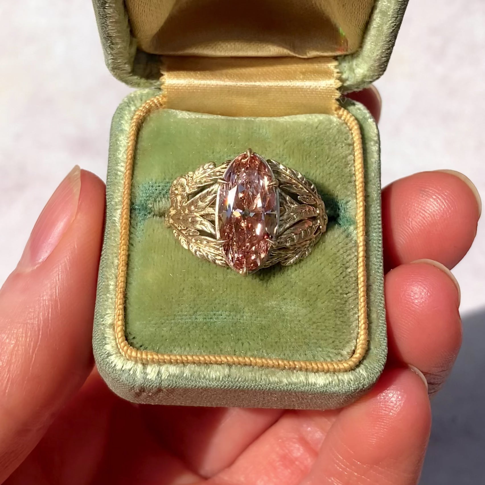 ::color_yellow ::| 3.05ct champagne moval lab diamond framed by a tangle of leaves, ferns, and forget me not flowers yellow gold in ring box video