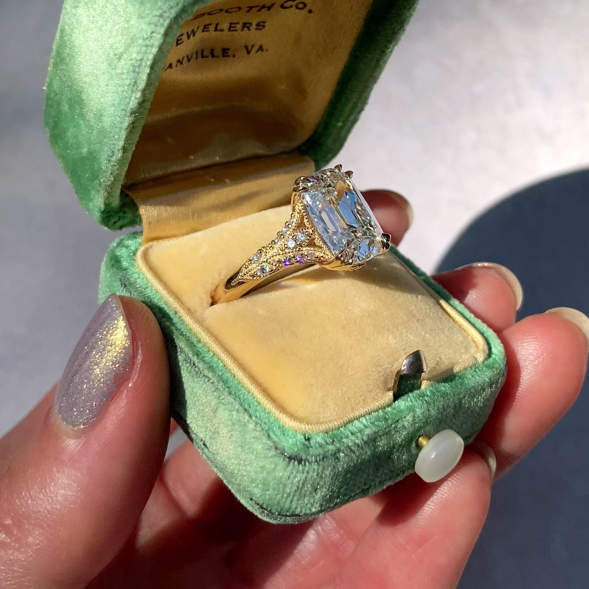 ::color_yellow ::| Florence Edwardian styled 4ct old mine cut lab-grown cushion diamond engagement ring with milgrain and diamond accents in yellow gold in ring box video