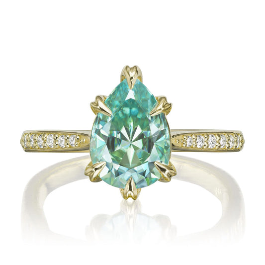 ::color_yellow ::| 2.1ctw pear aqua-teal moissanite engagement ring Petra yellow gold diamond shank front view