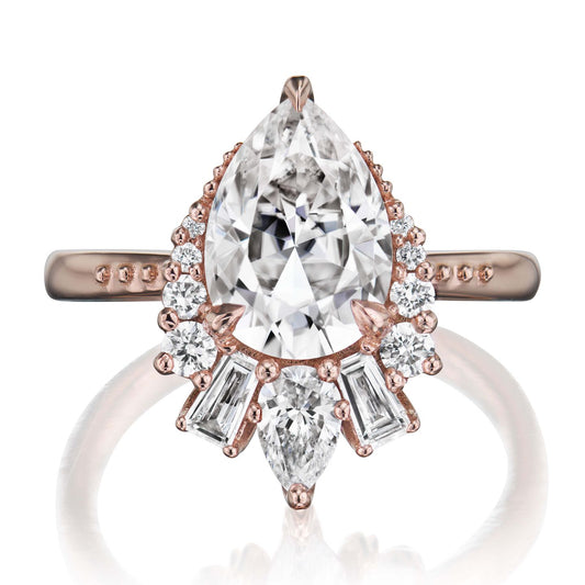 ::color_rose ::shank_no ::shank_three-quarters_halfway_no ::| 2.53ctw+ pear moissanite engagement ring with diamond accents Artemis rose gold front view