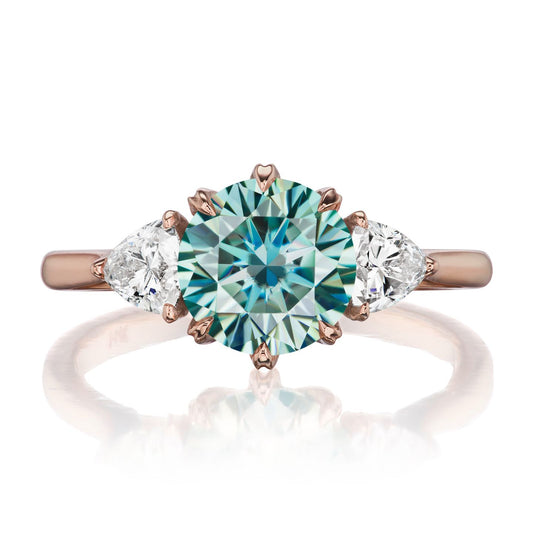 ::color_rose ::| 1.92ctw round aqua-teal moissanite three stone engagement ring Magnolia rose gold trillion diamonds front view