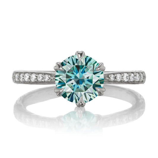 ::color_white ::| 1.25ctw round aqua-teal moissanite engagement ring Camille white gold diamond shank front view