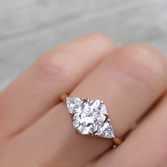 Oval and outlet trillion diamond ring