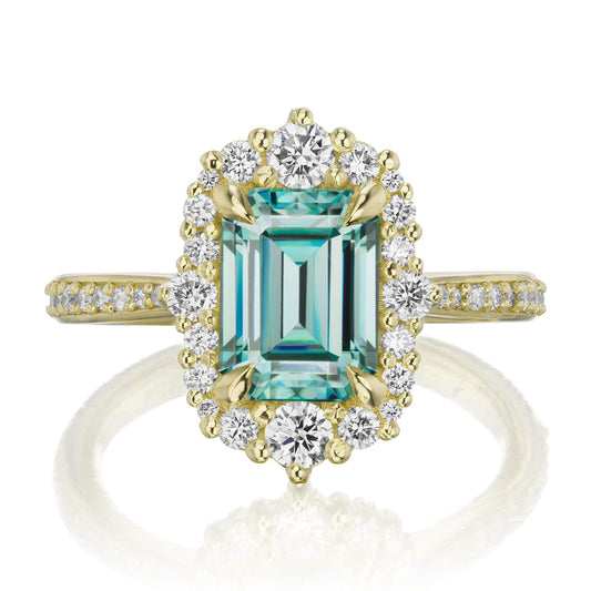 ::color_yellow ::shank_halfway_three-quarters ::shank_three-quarters_halfway_no ::| 2.16ctw+ Emerald cut aqua-teal moissanite engagement ring Adeline yellow gold diamond shank front view