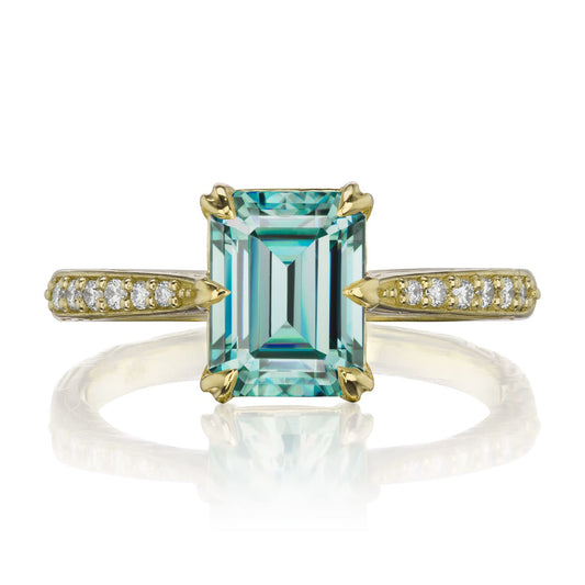 ::color_yellow ::| 1.75ctw emerald-cut aqua-teal moissanite engagement ring Naomi yellow gold diamond shank front view