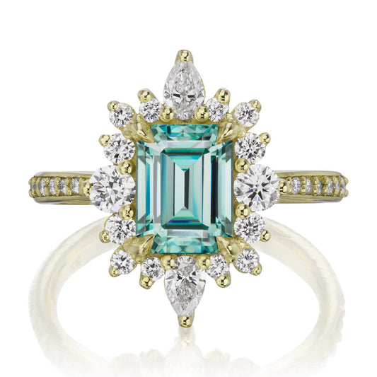 ::color_yellow ::shank_halfway_three-quarters ::shank_three-quarters_halfway_no ::| 2.33ctw+ emerald cut aqua-teal moissanite engagement ring Talia yellow gold diamond shank front view