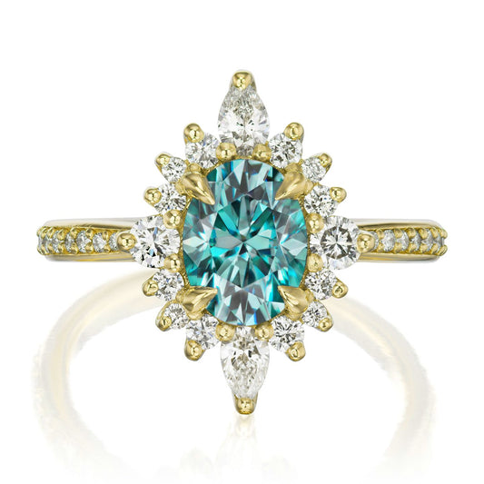 ::color_yellow ::shank_halfway_three-quarters ::shank_three-quarters_halfway_no ::| 1.98ctw+ oval aqua-teal moissanite engagement ring Anika yellow gold diamond shank front view