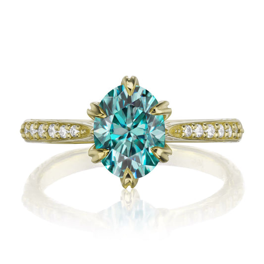 ::color_yellow ::| 1.5ctw oval aqua-teal moissanite engagement ring Layla yellow gold diamond shank front view
