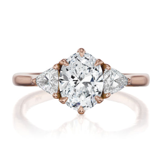 ::color_rose ::| 1.6ctw oval lab-grown diamond three stone engagement ring Juno rose gold trillion diamonds front view