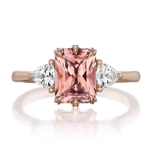 ::color_rose ::| 2.32ctw radiant peach sapphire three stone engagement ring Juno rose gold trillion diamonds front view
