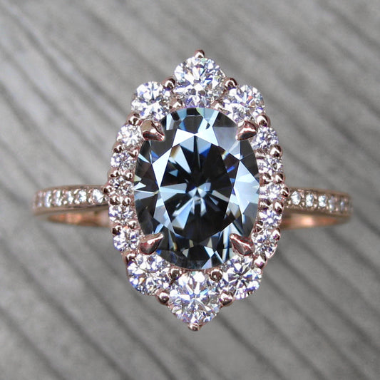 vintage inspired rose gold halo with an oval grey moissanite 