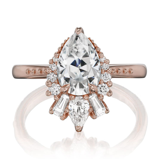 ::color_rose ::shank_no ::shank_three-quarters_halfway_no ::| 1.81ctw+ pear moissanite engagement ring with diamond accents Artemis rose gold front view