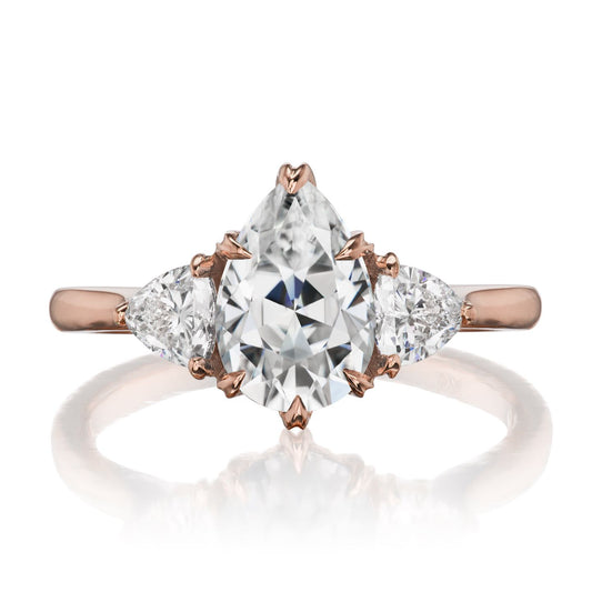 ::color_rose ::| 1.92ctw pear moissanite three stone engagement ring Brynn rose gold trillion diamonds front view